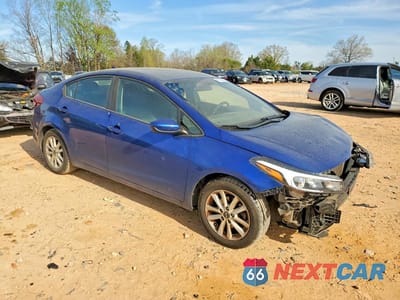 Czwarte zdjęcie samochodu z boku: 2017 KIA FORTE LX VIN:3KPFL4A75HE124319 - miniatura