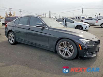 Czwarte zdjęcie samochodu z boku: 2017 BMW 330 I VIN:WBA8B9G32HNU53940 - miniatura
