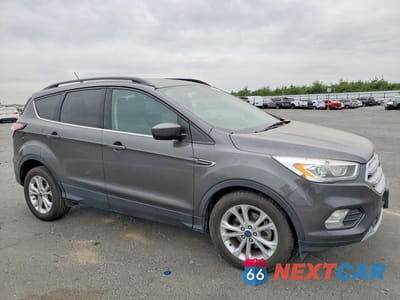 Czwarte zdjęcie samochodu z boku: 2018 FORD ESCAPE SEL VIN:1FMCU0HD9JUA24831 - miniatura