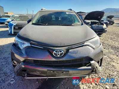 Piąte zdjęcie samochodu w środku: 2016 TOYOTA RAV4 XLE VIN:JTMRFREVXGJ077882 - miniatura