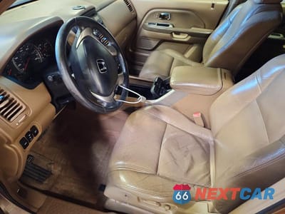 Zdjęcie 7 z 12 samochodu: 2004 HONDA PILOT EXL VIN:2HKYF185X4H525857 - miniatura