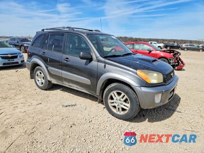 Czwarte zdjęcie samochodu z boku: 2003 TOYOTA RAV4 BASE VIN:JTEGH20V930117848 - miniatura