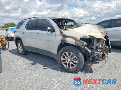 Czwarte zdjęcie samochodu z boku: 2019 CHEVROLET TRAVERSE LT VIN:1GNERGKW6KJ288424 - miniatura