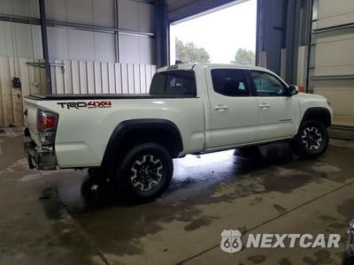 Trzecie zdjęcie samochodu z tyłu: 2023 TOYOTA TACOMA TRD OFF-ROAD VIN:3TMDZ5BN1PM156519 - miniatura