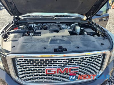 Zdjęcie 11 z 11 samochodu: 2015 GMC YUKON XL DENALI VIN:1GKS2JKJ4FR187847 - miniatura