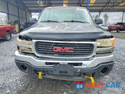 Piąte zdjęcie samochodu w środku: 2005 GMC NEW SIERRA C1500 VIN:2GTEC19TX51180759 - miniatura