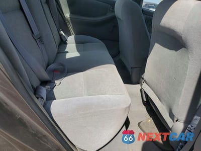 Zdjęcie 10 z 12 samochodu: 2003 TOYOTA COROLLA CE VIN:1NXBR32E73Z125546 - miniatura