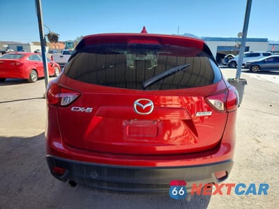Zdjęcie 6 z 13 samochodu: 2014 MAZDA CX-5 TOURING VIN:JM3KE2CY8E0356475 - miniatura