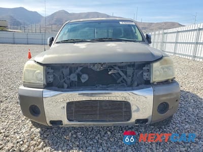Piąte zdjęcie samochodu w środku: 2006 NISSAN TITAN XE VIN:1N6AA06A06N541155 - miniatura