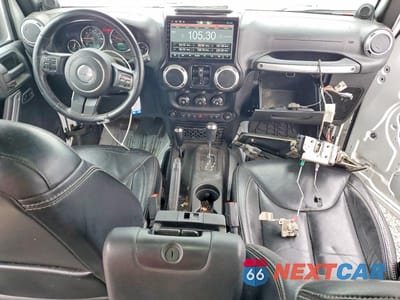 Zdjęcie 8 z 13 samochodu: 2013 JEEP WRANGLER UNLIMITED SAHARA VIN:1C4BJWEG8DL695038 - miniatura