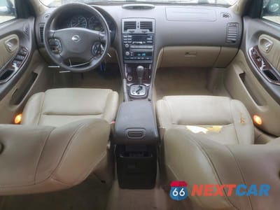 Zdjęcie 8 z 12 samochodu: 2002 NISS MAXIMA GXE VIN:JN1DA31D12T203274 - miniatura