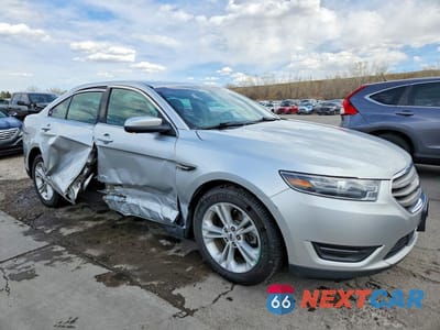 Czwarte zdjęcie samochodu z boku: 2017 FORD TAURUS SEL VIN:1FAHP2H8XHG143096 - miniatura