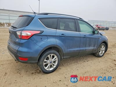 Trzecie zdjęcie samochodu z tyłu: 2018 FORD ESCAPE SE VIN:1FMCU9GD5JUC86691 - miniatura