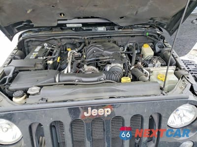 Zdjęcie 11 z 12 samochodu: 2014 JEEP WRANGLER UNLIMITED SAHARA VIN:1C4BJWEG3EL118290 - miniatura