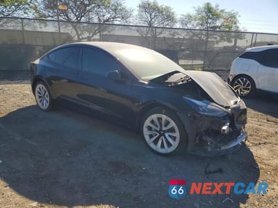 Czwarte zdjęcie samochodu z boku: 2022 TESLA MODEL 3 VIN:5YJ3E1EA7NF290493 - miniatura