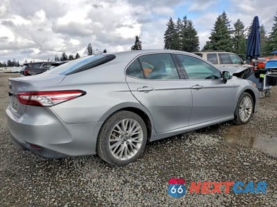 Trzecie zdjęcie samochodu z tyłu: 2018 TOYOTA CAMRY HYBRID XLE VIN:4T1B21HK6JU505013 - miniatura