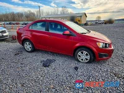 Czwarte zdjęcie samochodu z boku: 2014 CHEV SONIC VIN:1G1JC5SH9E4222007 - miniatura