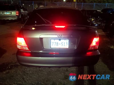 Zdjęcie 6 z 14 samochodu: 2002 HYUNDAI ACCENT VIN:KMHCG35C12U213978 - miniatura