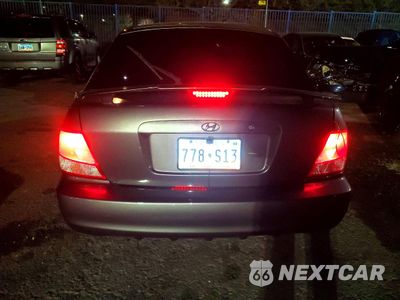 Zdjęcie 6 z 14 samochodu: 2002 HYUNDAI ACCENT VIN:KMHCG35C12U213978 - miniatura