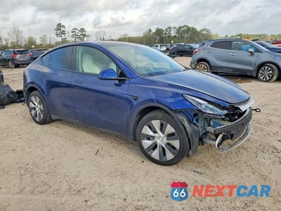 Czwarte zdjęcie samochodu z boku: 2023 TESLA MODEL Y VIN:7SAYGDEE7PF620188 - miniatura