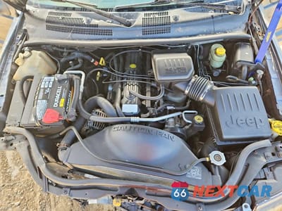 Zdjęcie 12 z 13 samochodu: 2000 JEEP GRAND CHEROKEE LAREDO VIN:1J4G248S8YC410703 - miniatura