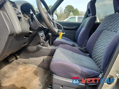 Zdjęcie 7 z 13 samochodu: 1999 TOYOTA RAV4 BASE VIN:JT3HP10V3X7141845 - miniatura