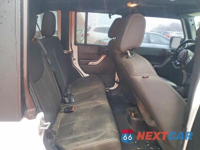 Zdjęcie 11 z 13 samochodu: 2016 JEEP WRANGLER UNLIMITED SAHARA VIN:1C4HJWEG3GL106377 - miniatura