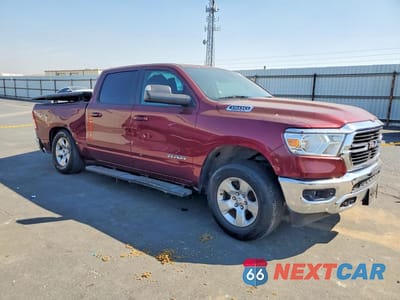 Czwarte zdjęcie samochodu z boku: 2021 RAM 1500 BIG HORN VIN:1C6SRFFT9MN559436 - miniatura