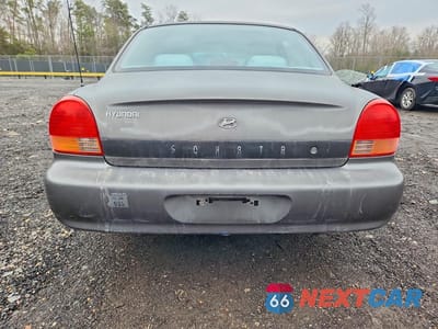 Zdjęcie 6 z 11 samochodu: 2000 HYUNDAI SONATA GL VIN:KMHWF25S6YA286680 - miniatura