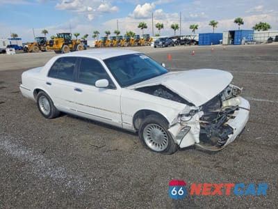 Czwarte zdjęcie samochodu z boku: 2000 MERCURY GRAND MARQUIS LS VIN:2MEFM75W6YX605222 - miniatura