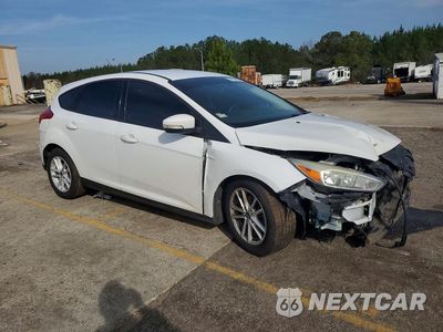 Czwarte zdjęcie samochodu z boku: 2017 FORD FOCUS SE VIN:1FADP3K20HL286669 - miniatura