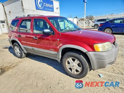 Czwarte zdjęcie samochodu z boku: 2001 FORD ESCAPE XLT VIN:1FMYU04171KB73025 - miniatura