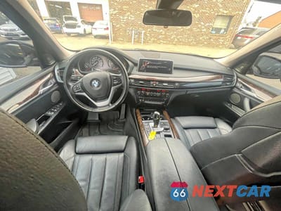 Zdjęcie 7 z 10 samochodu: 2014 BMW X5 XDRIVE50I VIN:5UXKR6C52E0C02548 - miniatura