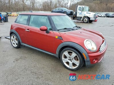 Czwarte zdjęcie samochodu z boku: 2007 MINI COOPER VIN:WMWMF33527TU61263 - miniatura