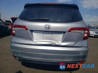 Zdjęcie 6 z 12 samochodu: 2020 HONDA PILOT LX VIN:5FNYF5H11LB027483 - miniatura