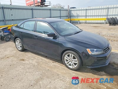 Czwarte zdjęcie samochodu z boku: 2015 VOLKSWAGEN JETTA BASE VIN:3VW2K7AJ3FM351703 - miniatura