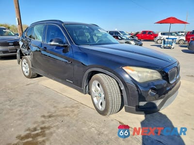 Czwarte zdjęcie samochodu z boku: 2014 BMW X1 SDRIVE28I VIN:WBAVM1C53EVW47247 - miniatura