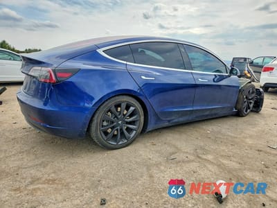 Trzecie zdjęcie samochodu z tyłu: 2017 TESLA MODEL 3 VIN:5YJ3E1EA5HF001051 - miniatura