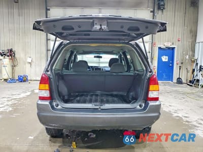 Zdjęcie 6 z 13 samochodu: 2003 MAZDA TRIBUTE LX VIN:4F2YZ941X3KM47248 - miniatura