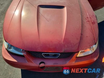 Zdjęcie 11 z 12 samochodu: 1999 FORD MUSTANG VIN:1FAFP4047XF136378 - miniatura