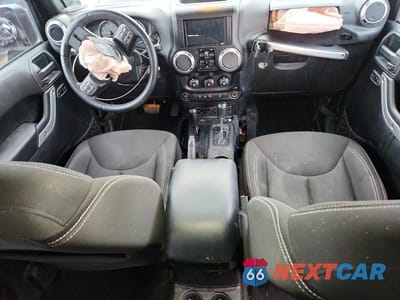 Zdjęcie 8 z 13 samochodu: 2016 JEEP WRANGLER UNLIMITED SAHARA VIN:1C4BJWEG9GL347155 - miniatura