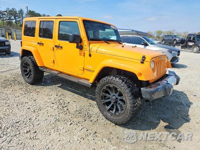 Czwarte zdjęcie samochodu z boku: 2012 JEEP WRANGLER UNLIMITED SAHARA VIN:1C4BJWEGXCL133897 - miniatura