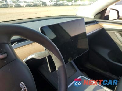 Zdjęcie 9 z 12 samochodu: 2022 TESLA MODEL Y VIN:7SAYGDEE9NF574991 - miniatura