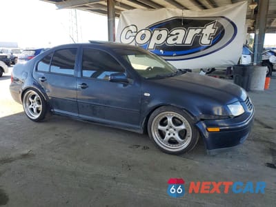 Czwarte zdjęcie samochodu z boku: 2000 VOLKSWAGEN JETTA GLS VIN:3VWSC29M1YM070257 - miniatura