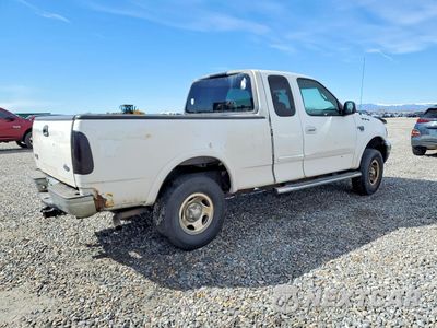 Trzecie zdjęcie samochodu z tyłu: 2002 FORD F150 VIN:1FTRX18L02KB05832 - miniatura