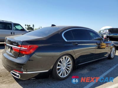 Trzecie zdjęcie samochodu z tyłu: 2018 BMW 740 I VIN:WBA7E2C53JG742000 - miniatura