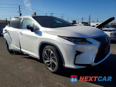 Czwarte zdjęcie samochodu z boku: 2018 LEXUS RX 350 BASE VIN:2T2ZZMCA2JC114884 - miniatura