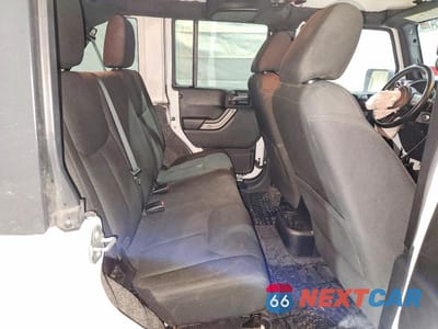 Zdjęcie 10 z 13 samochodu: 2015 JEEP WRANGLER SPORT VIN:1C4BJWDG3FL556536 - miniatura