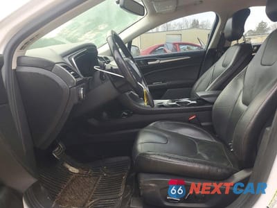 Zdjęcie 7 z 11 samochodu: 2013 FORD FUSION TITANIUM VIN:3FA6P0K90DR331139 - miniatura