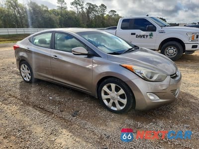 Czwarte zdjęcie samochodu z boku: 2012 HYUNDAI ELANTRA LIMITED VIN:5NPDH4AE1CH117654 - miniatura